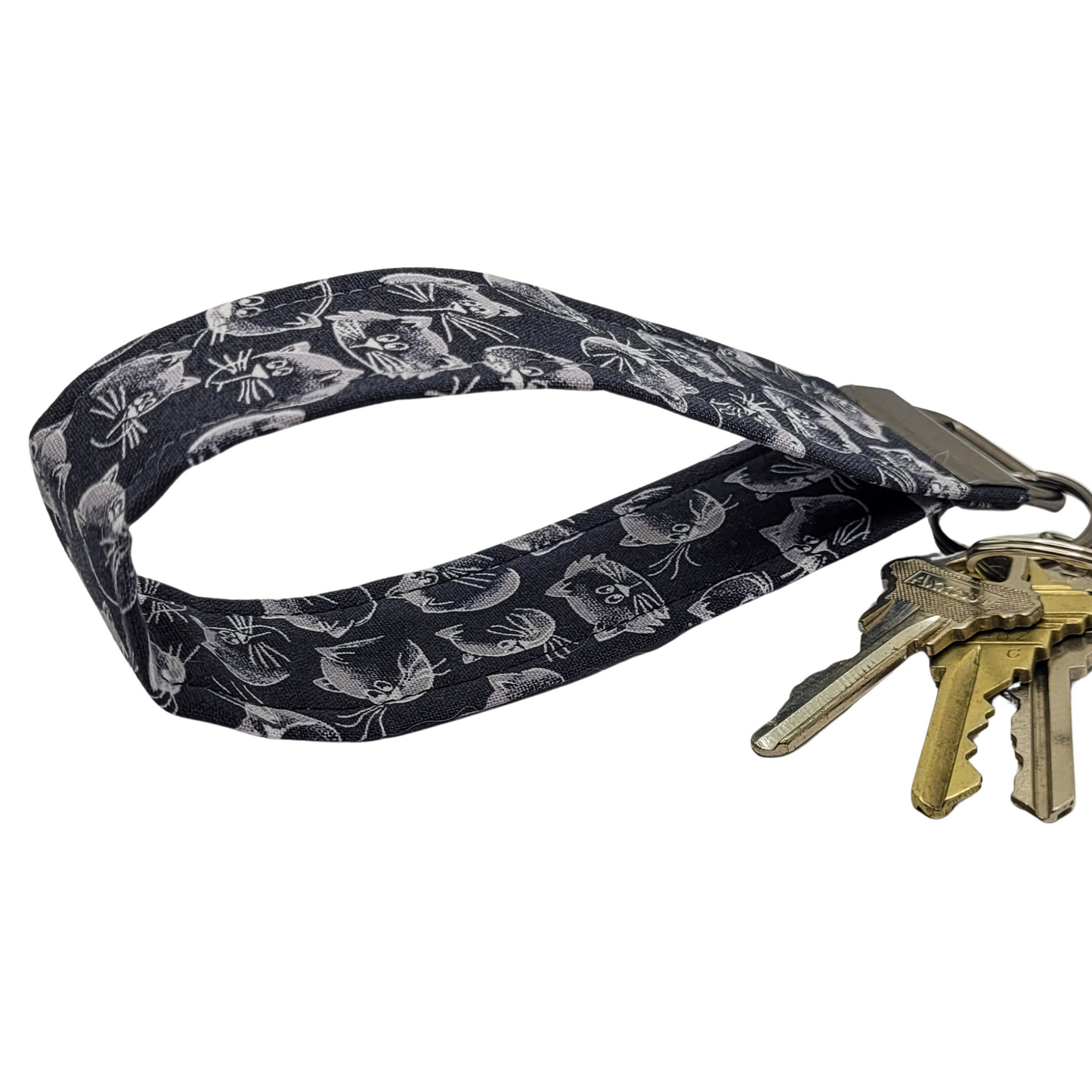 Porte-clés bracelet à visages de chat noir
