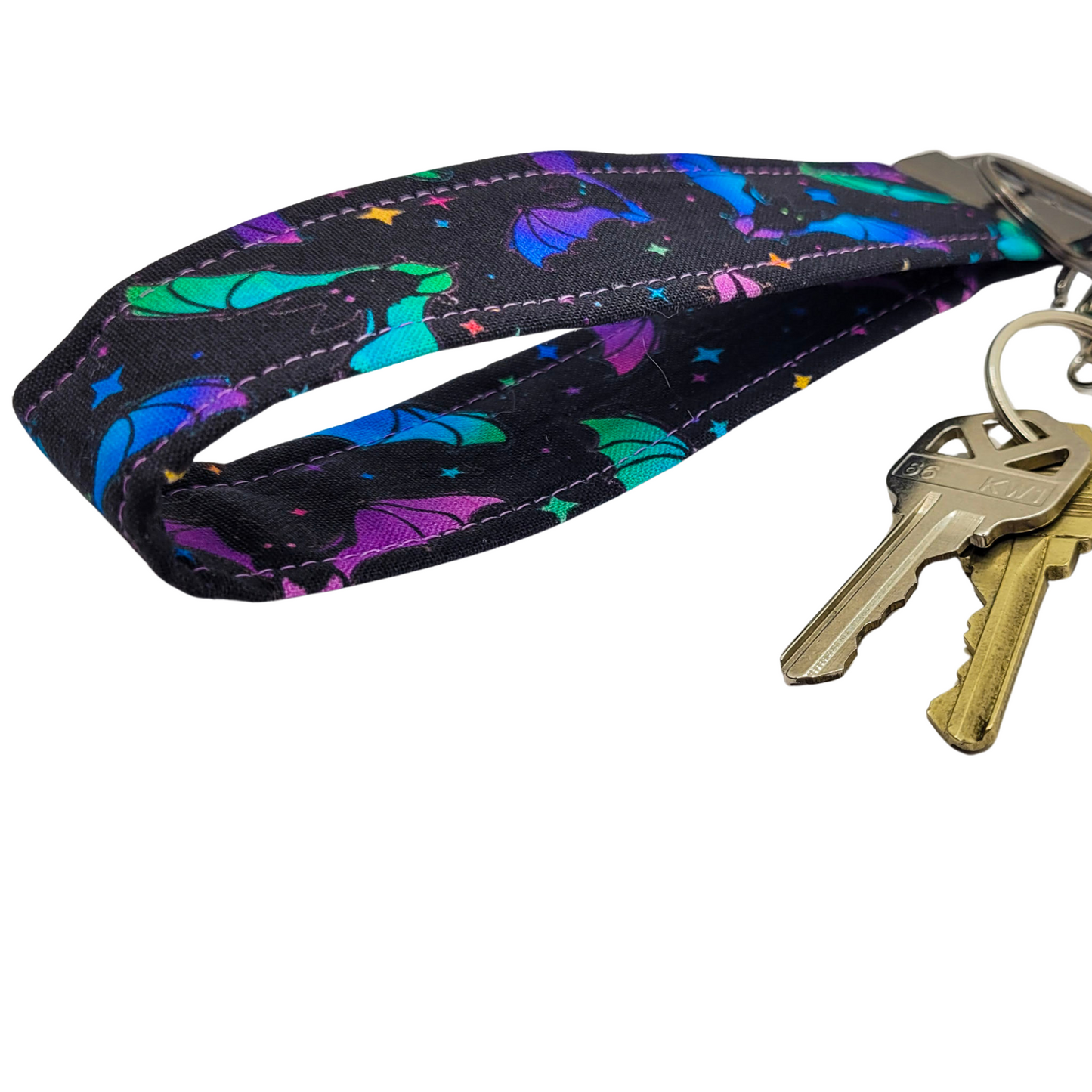 Porte-clés avec dragonne et motif chauve-souris pastel
