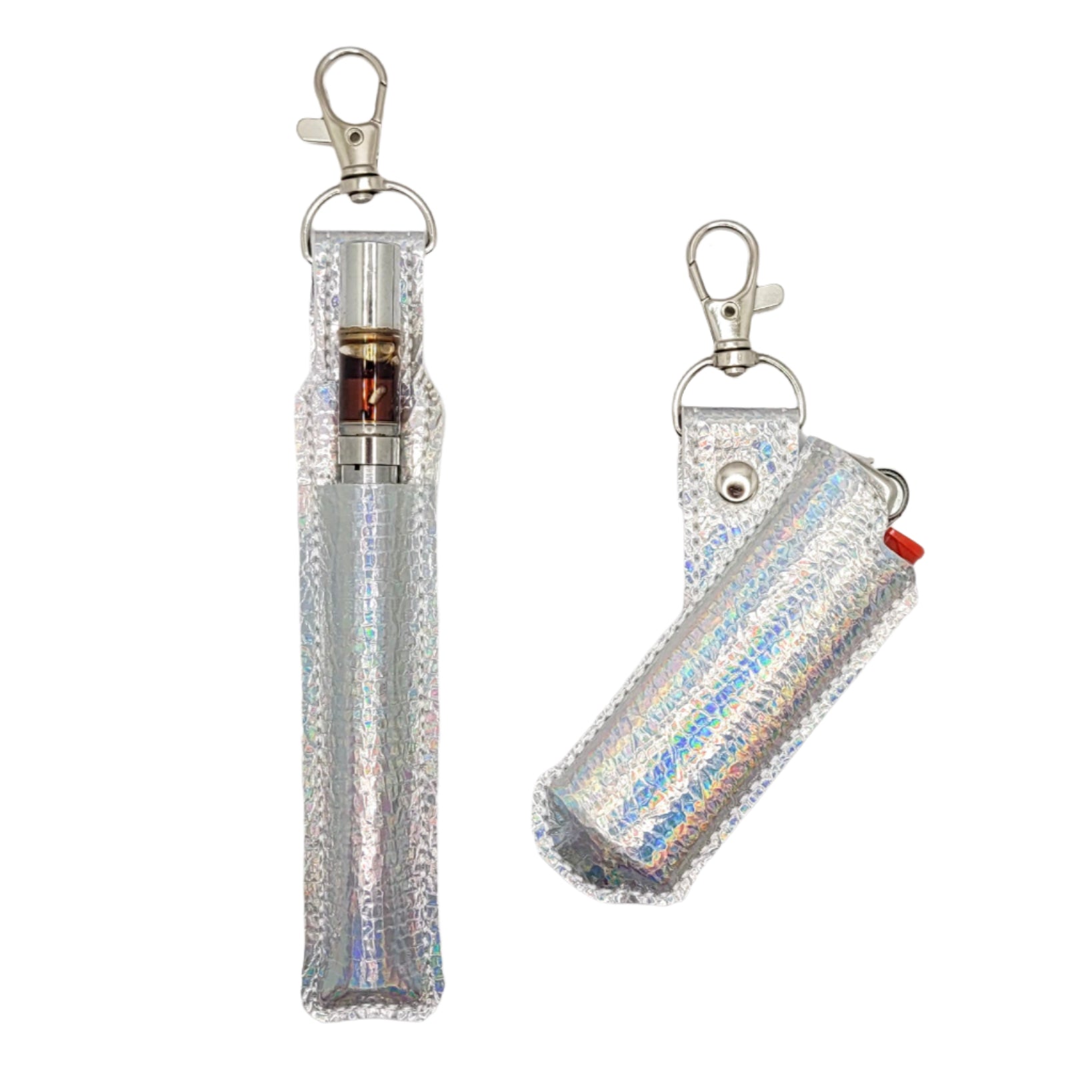 Two silver glittery cases with keychains on a marble surface