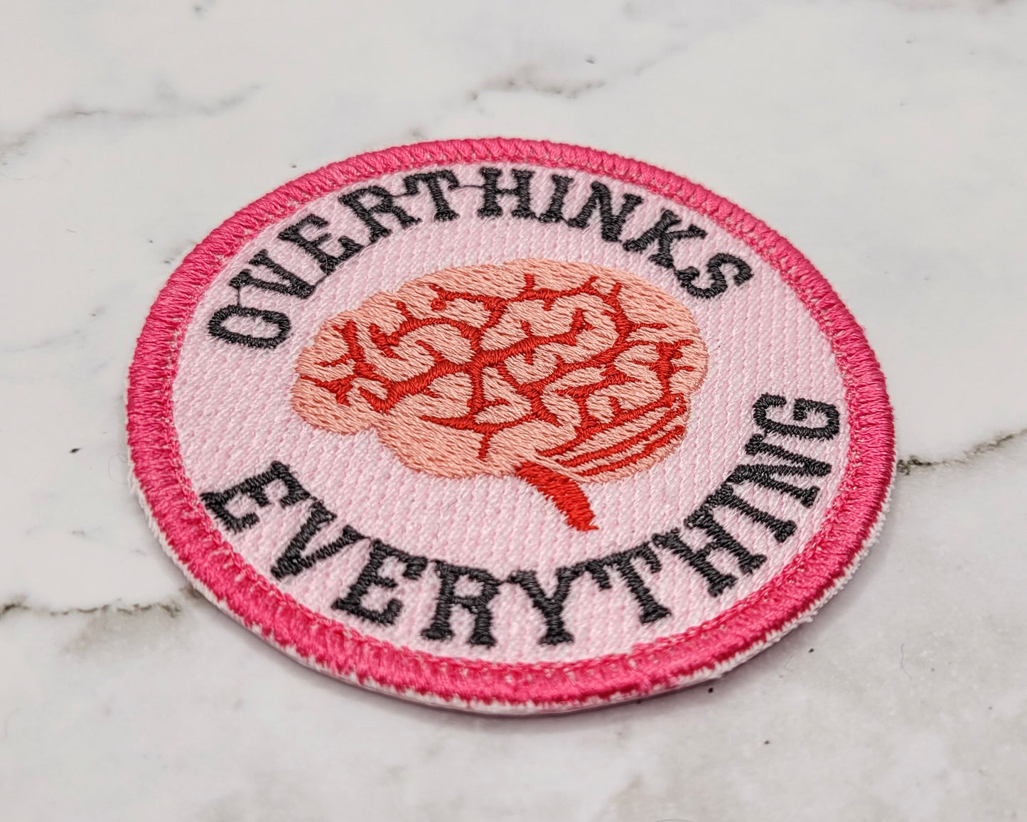 Overthinks Everything Merit Badge