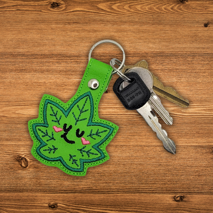 Cutie Cannabis Leaf Embroidered Vinyl Keychain