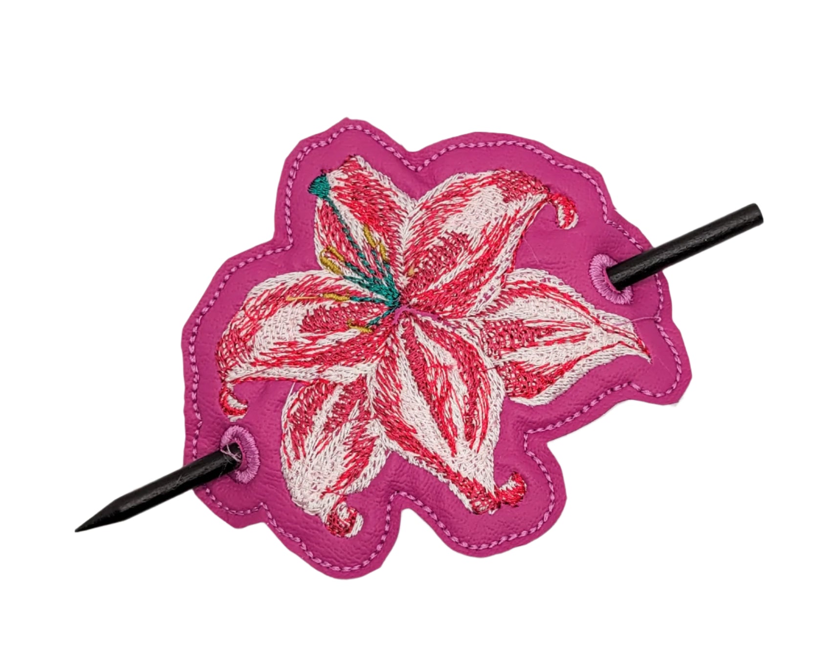 Floral hair clip with pink background on a white background