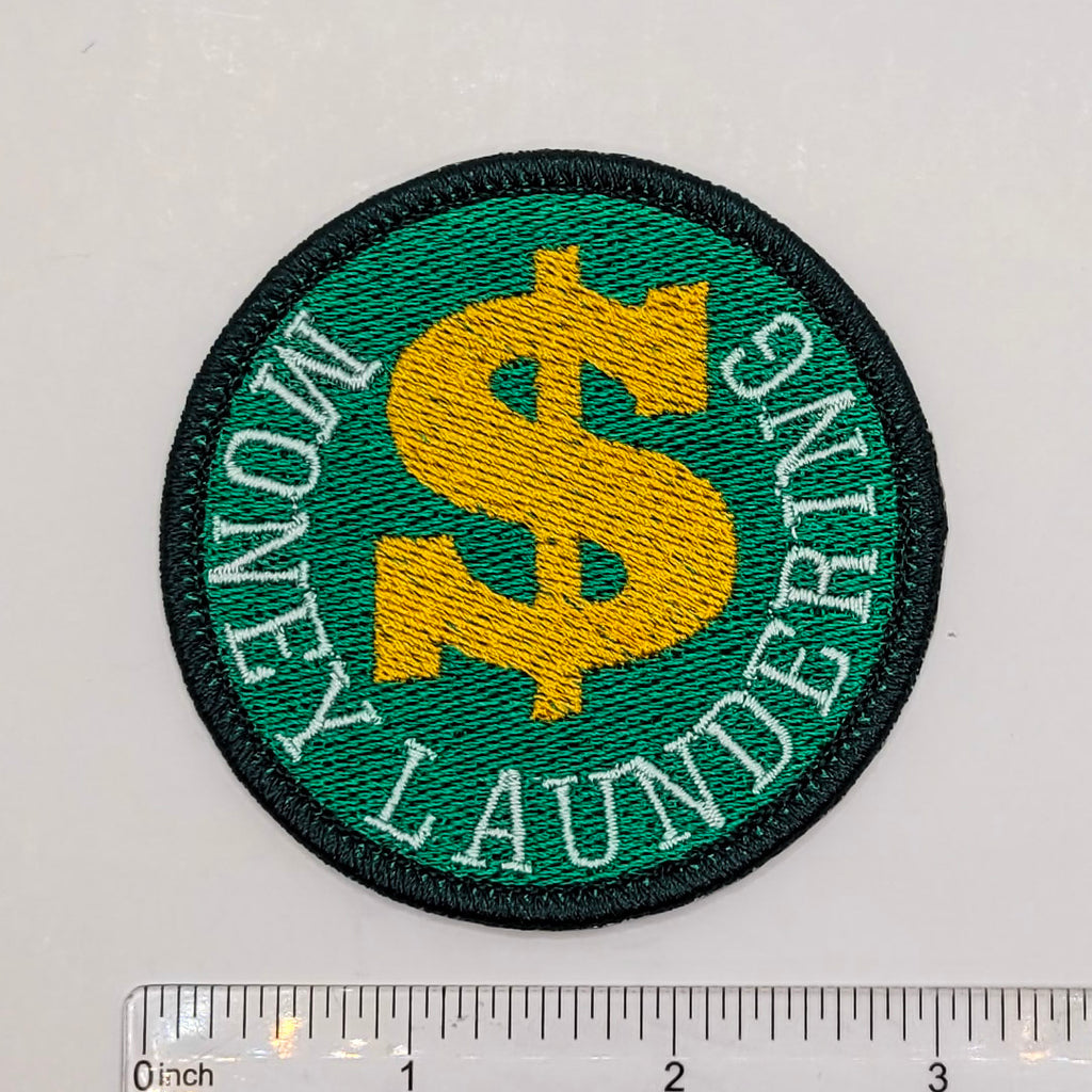 Badge de mérite coquin pour le blanchiment d'argent