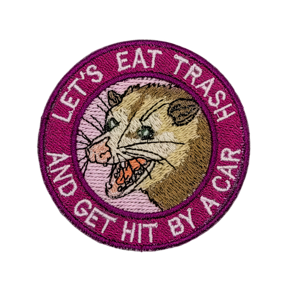 Embroidered patch with a possum illustration and text on a white background