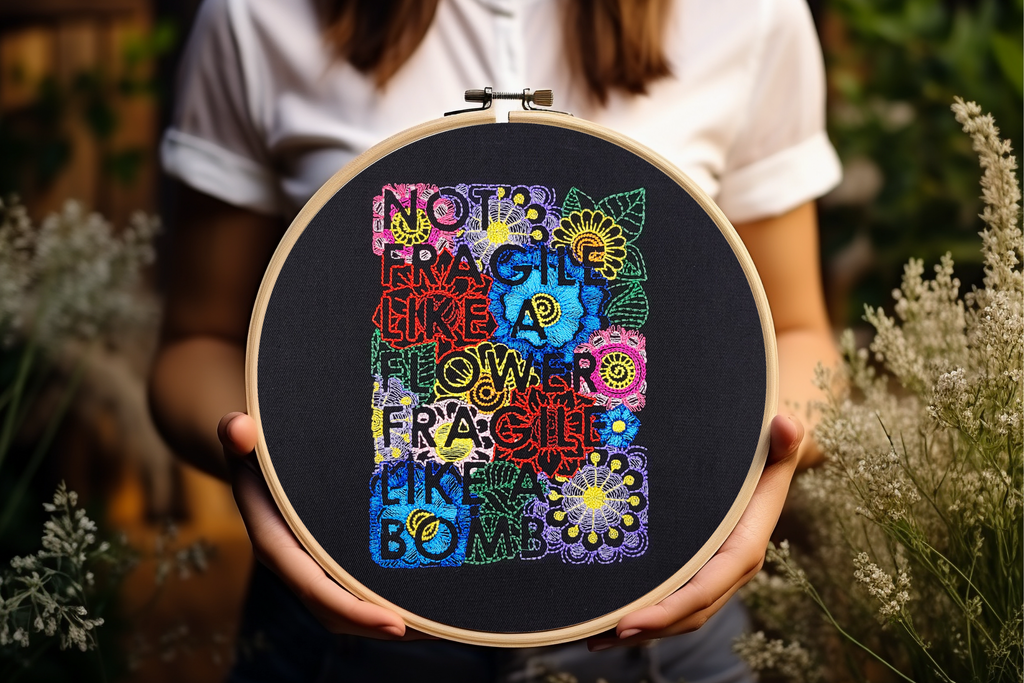 Not Fragile Like a Flower, Fragile Like a Bomb Embroidered Wall Hanging - 10" Hoop