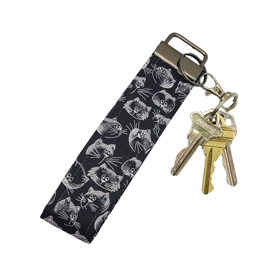 Porte-clés bracelet à visages de chat noir