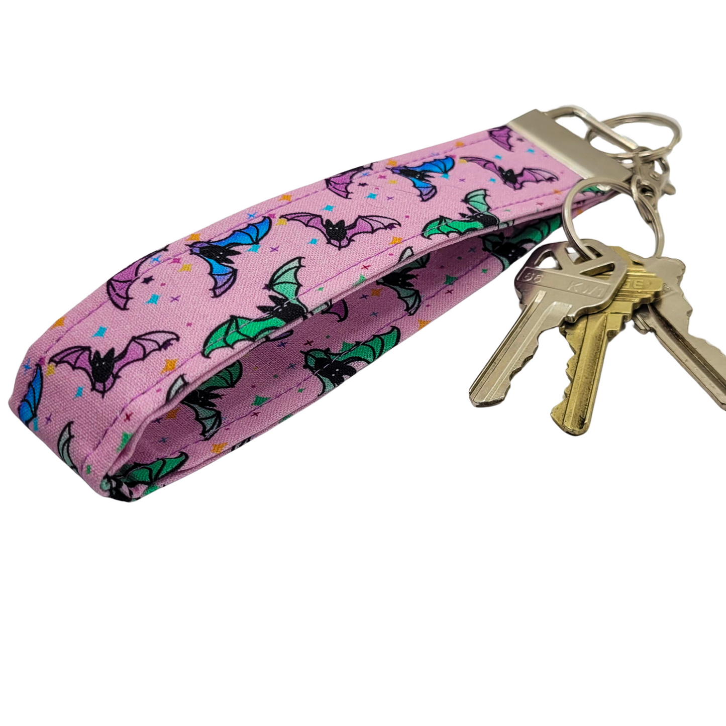 Porte-clés avec dragonne et motif chauve-souris pastel