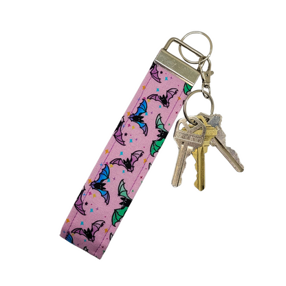 Porte-clés avec dragonne et motif chauve-souris pastel