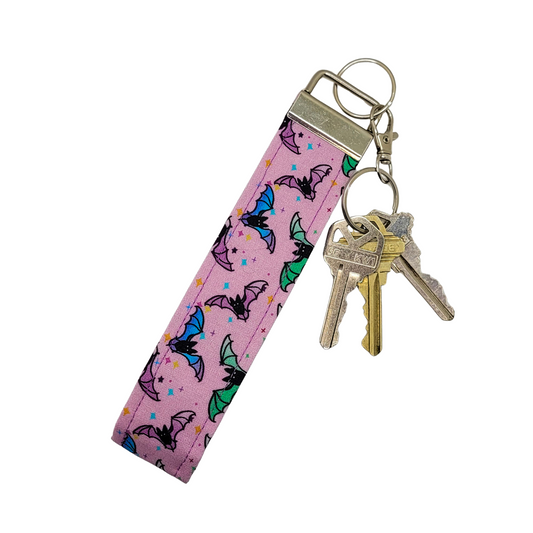 Porte-clés avec dragonne et motif chauve-souris pastel