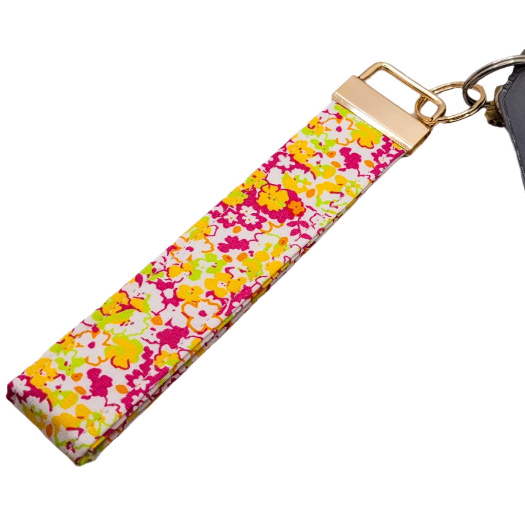 Floral patterned keychain on a white background.