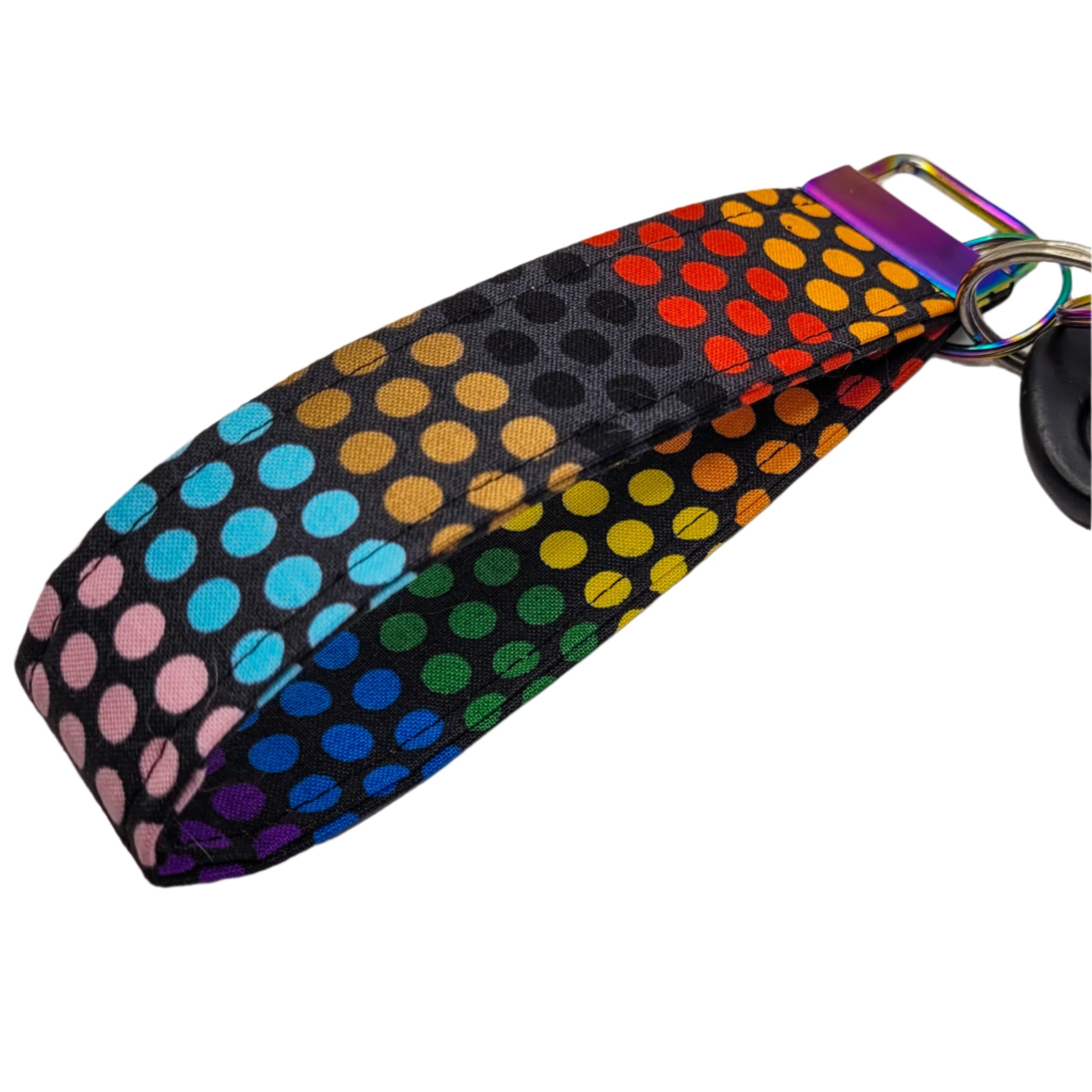 Multicolored polka dot keychain strap on a white background