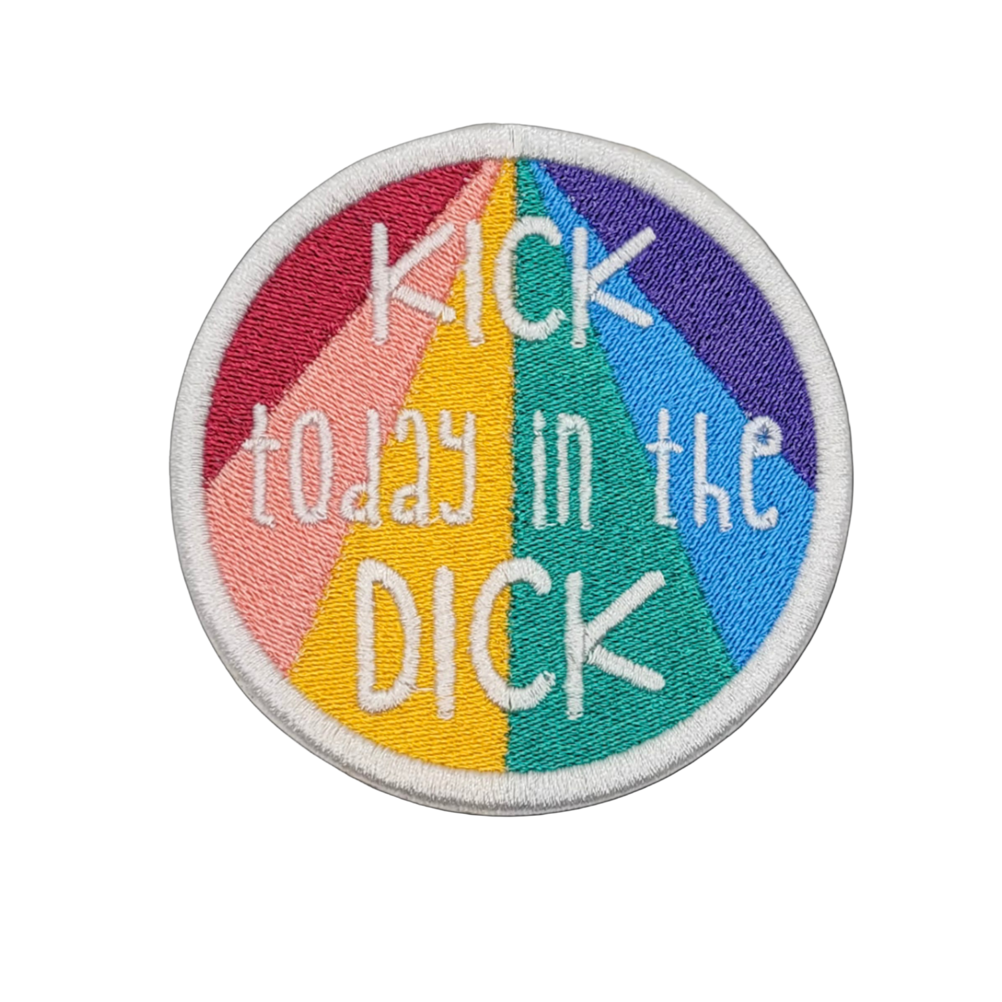 A multicolored embroidered patch with the text 'KICK TODAY IN THE DICK' on a dark background, surrounded by a rainbow starburst pattern.