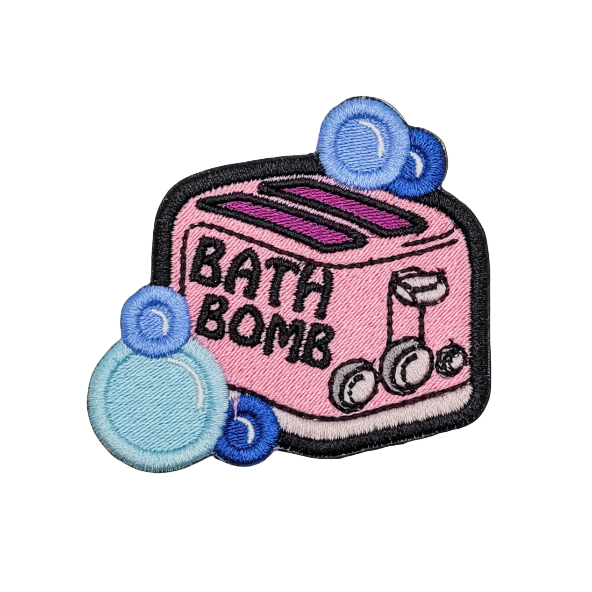An embroidered patch featuring a toaster with the words 'BATH BOMB' and bubbles in blue and pink colors.