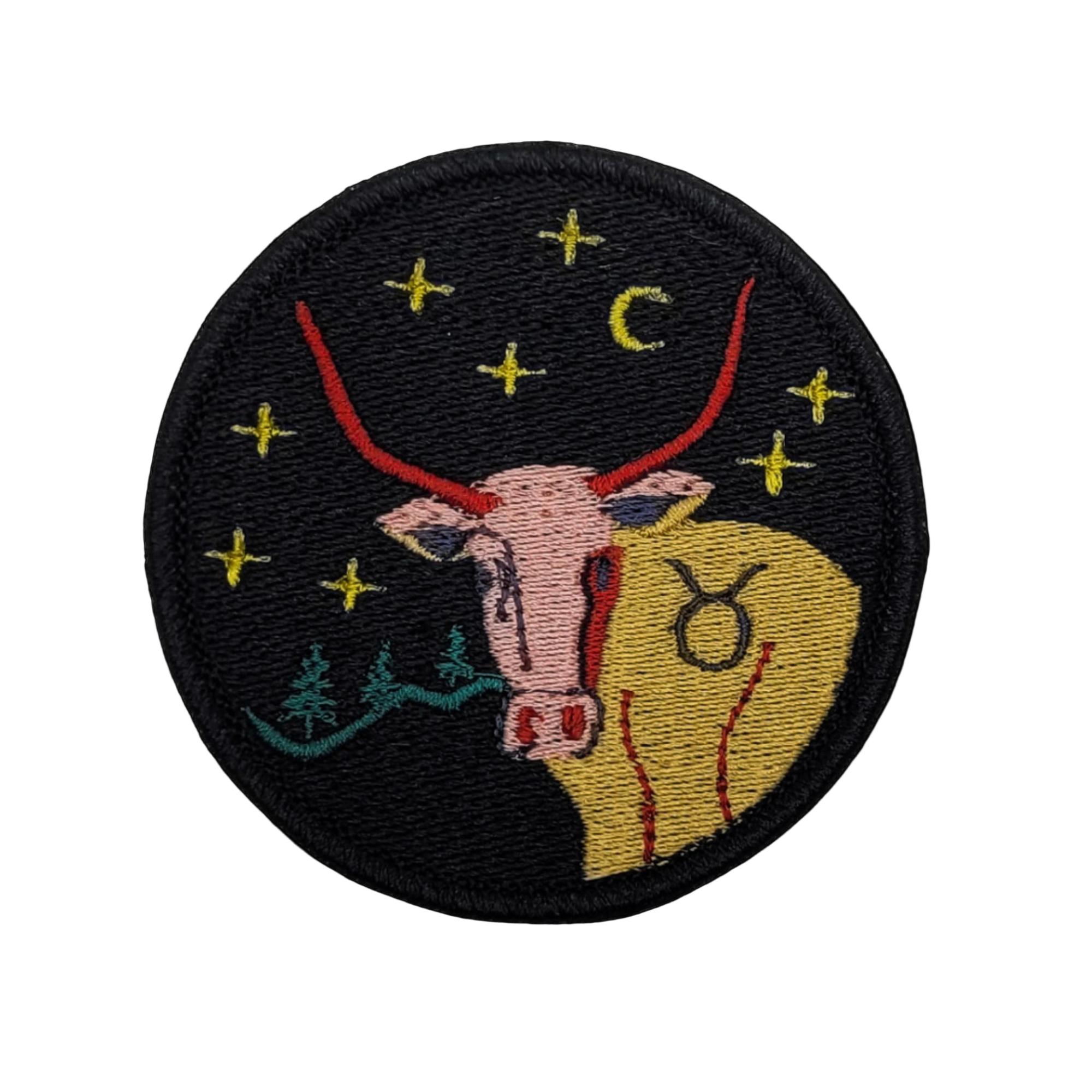 An embroidered patch featuring the Taurus zodiac sign with a bull's head, moon, and stars against a dark background.