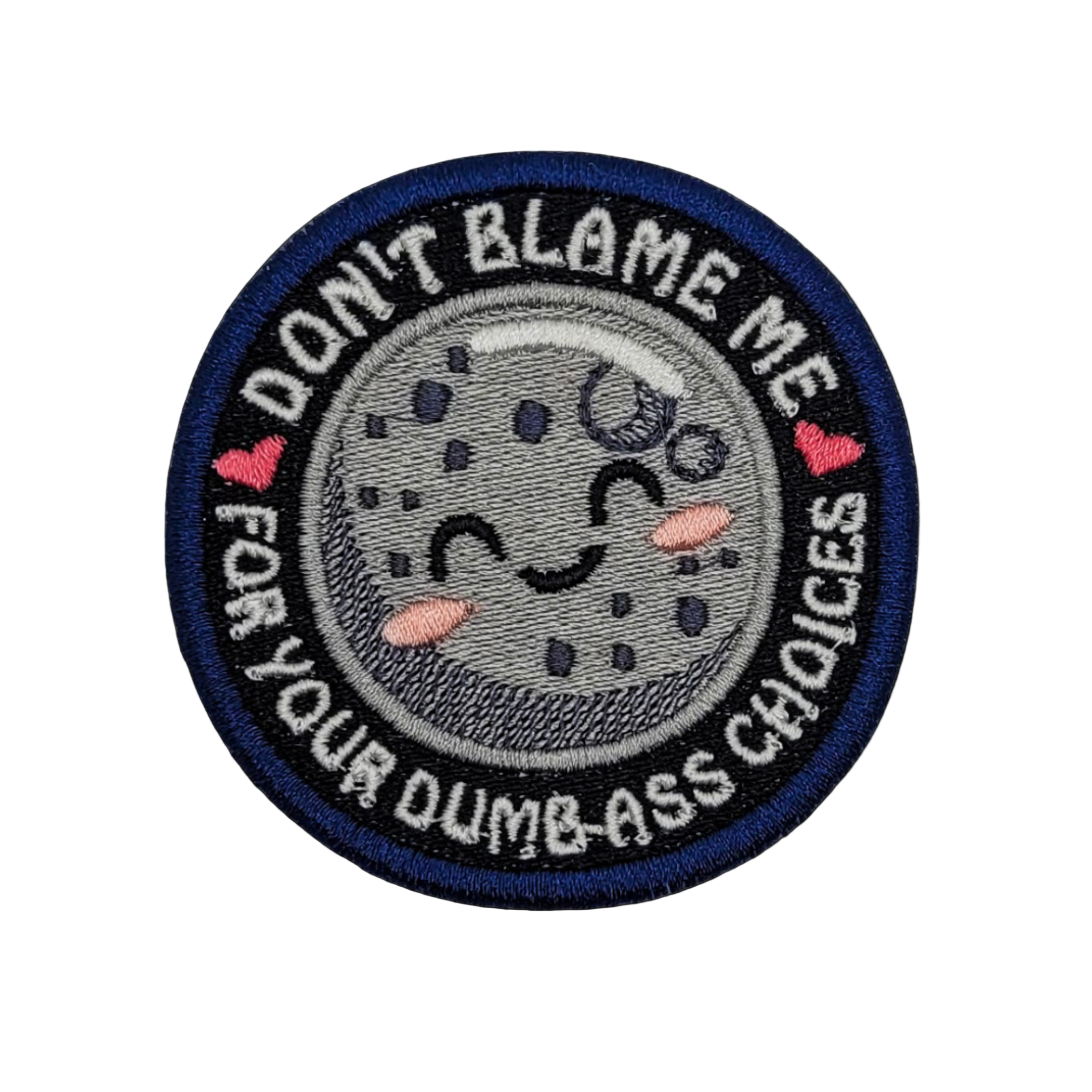 An embroidered patch with a moon character and the text 'DON'T BLAME ME FOR YOUR DUMB ASS CHOICES' on a blue background.