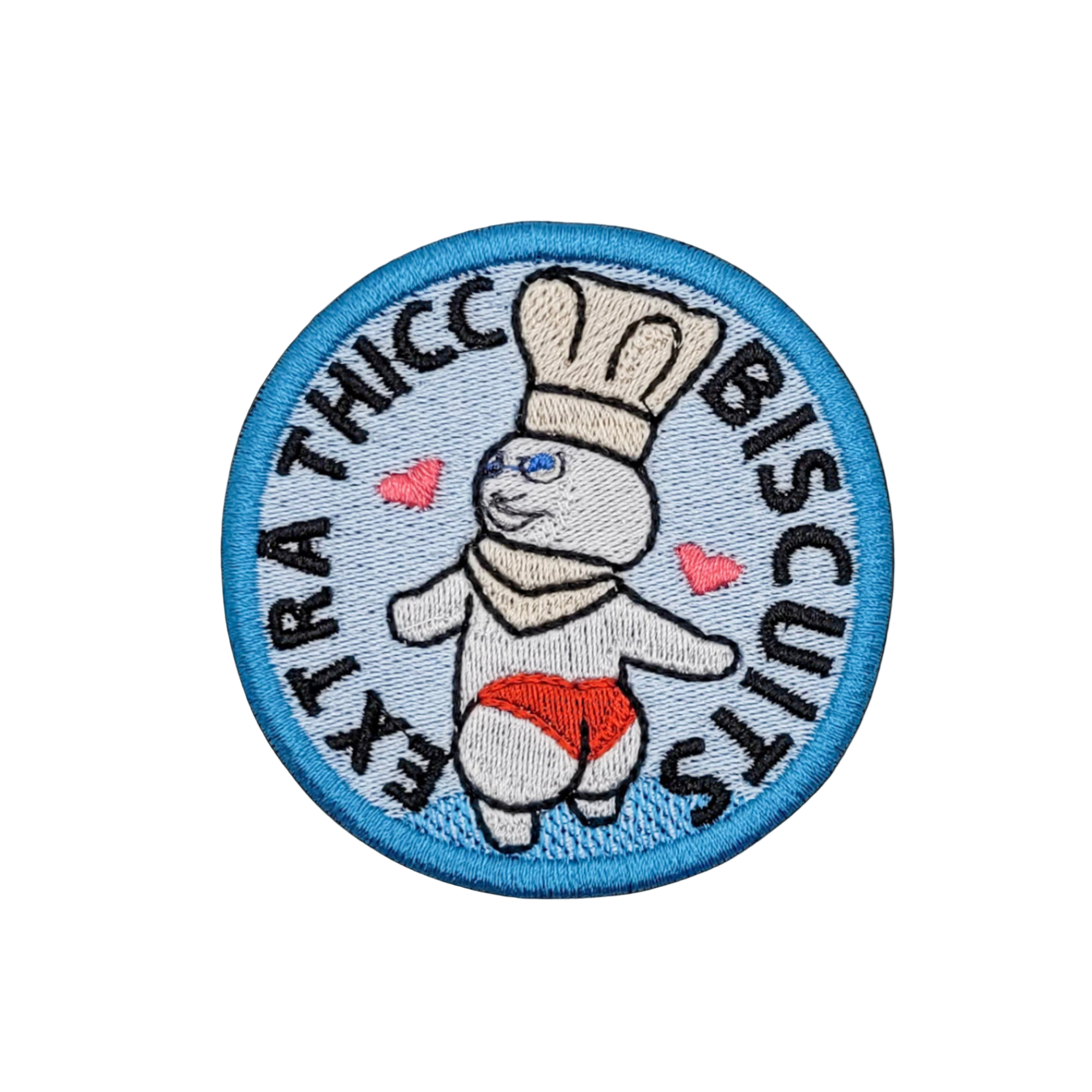 An embroidered patch featuring a cartoon character with the text 'EXTRA THICC BISCUITS' below it.