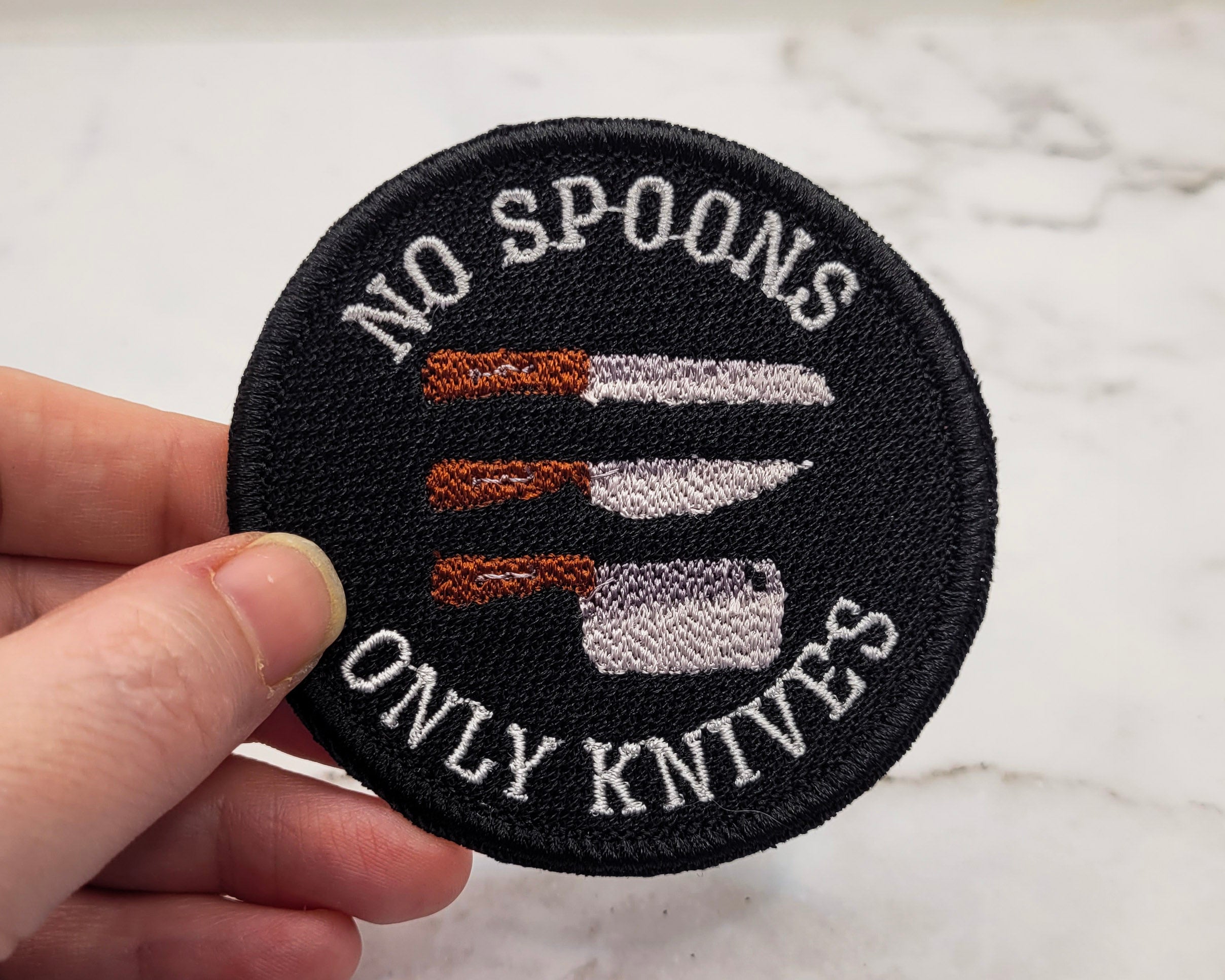 Patch brodé « Pas de cuillères, seulement des couteaux »