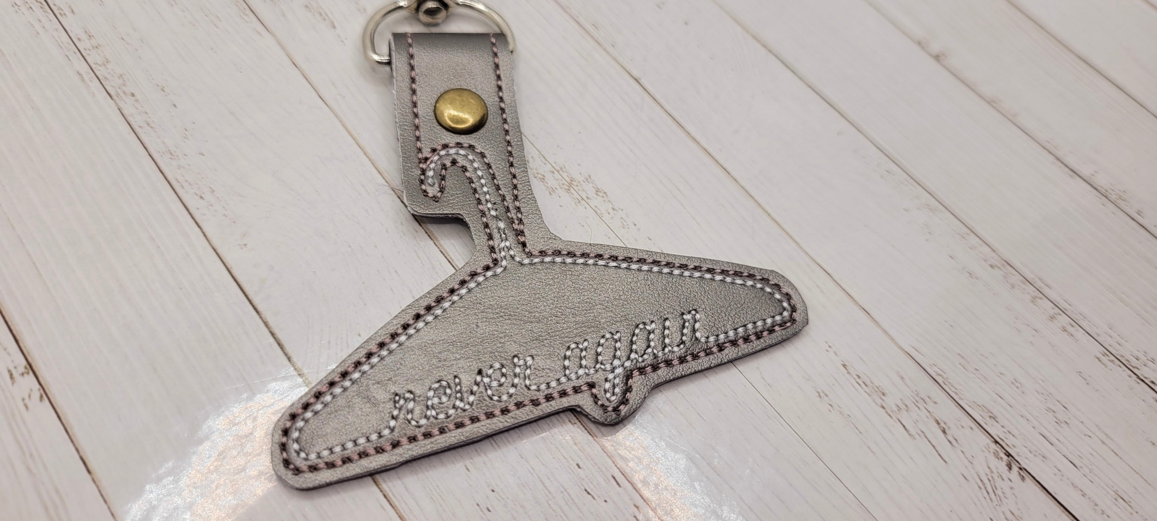 Never Again Metal Hanger Vinyl Embroidered Keychain