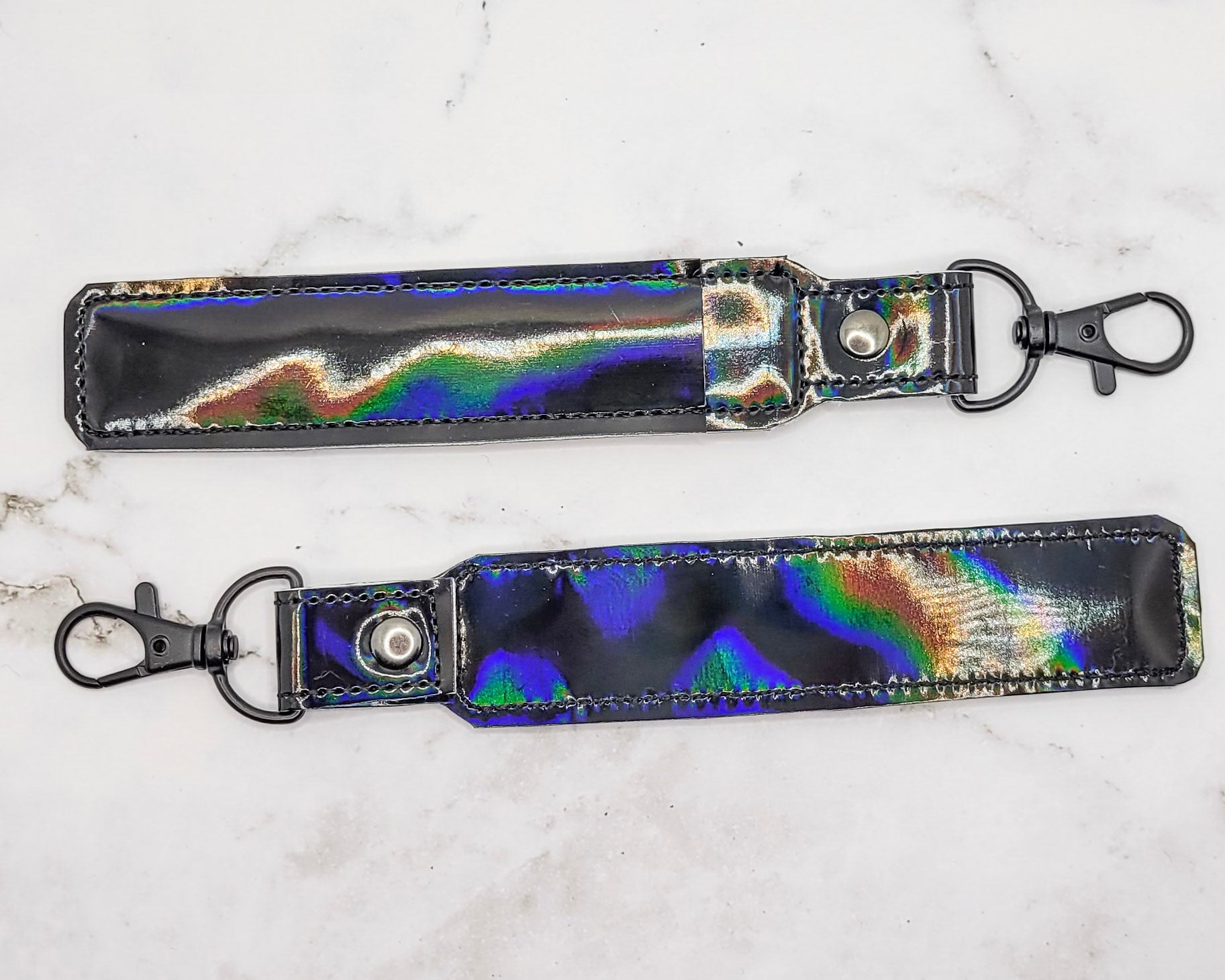 Estuche y soporte para bolígrafo holográfico negro