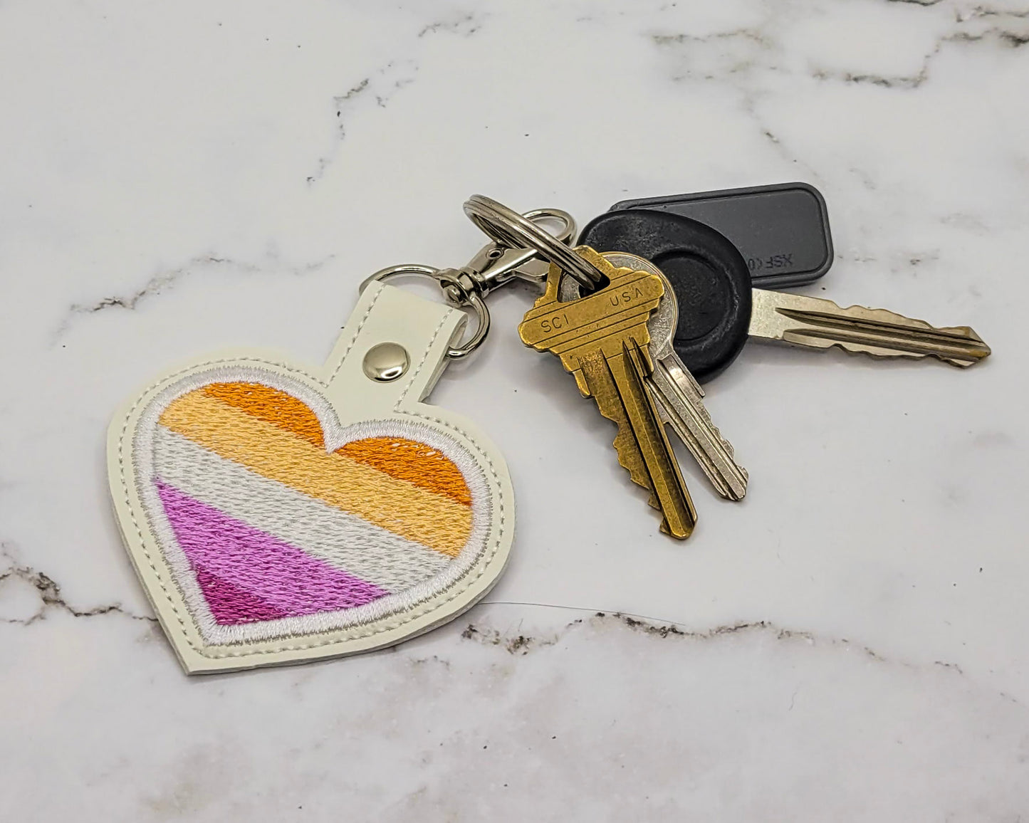 Lesbian Flag Heart Vinyl Keychain