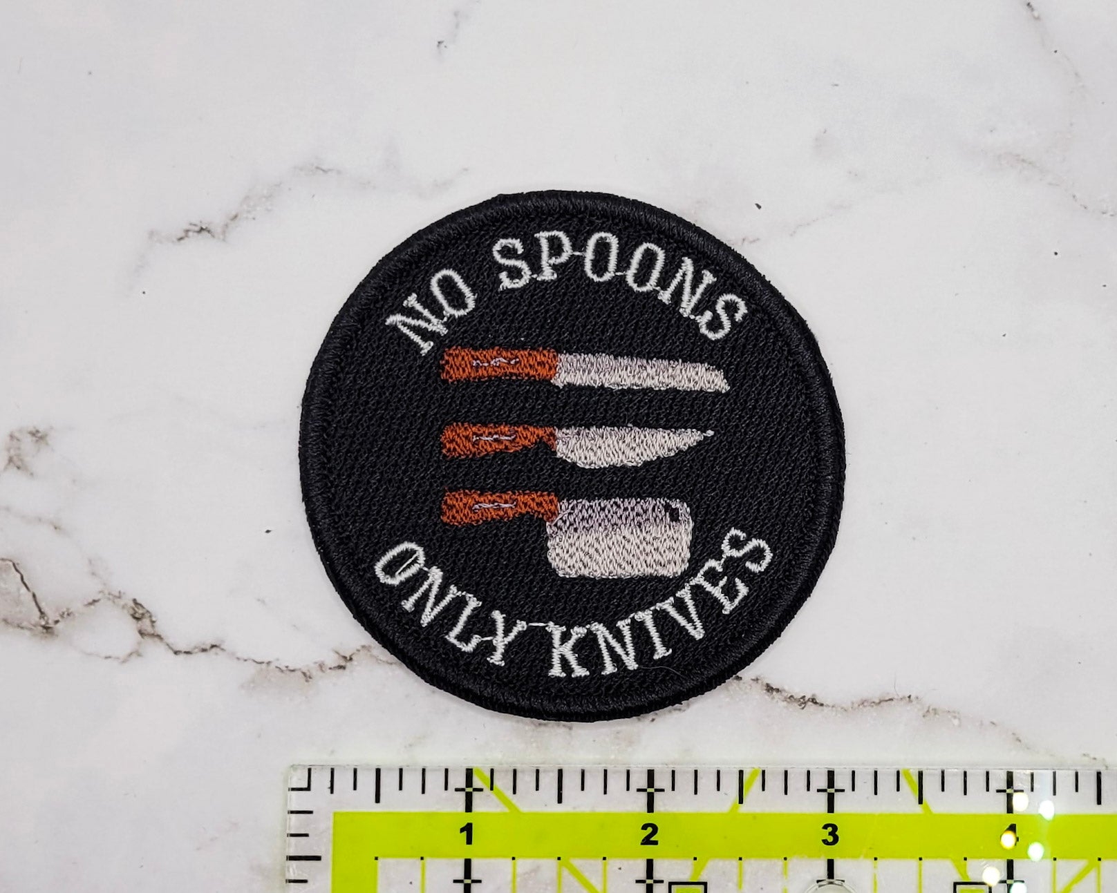 Patch brodé « Pas de cuillères, seulement des couteaux »