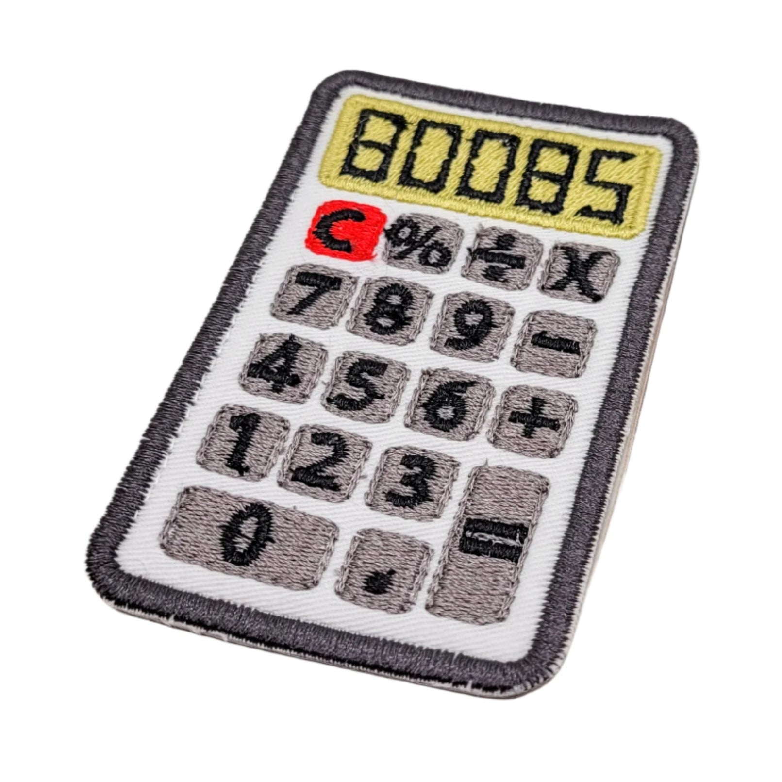 Patch of a calculator with 'BOOBS' Calculator on a white background