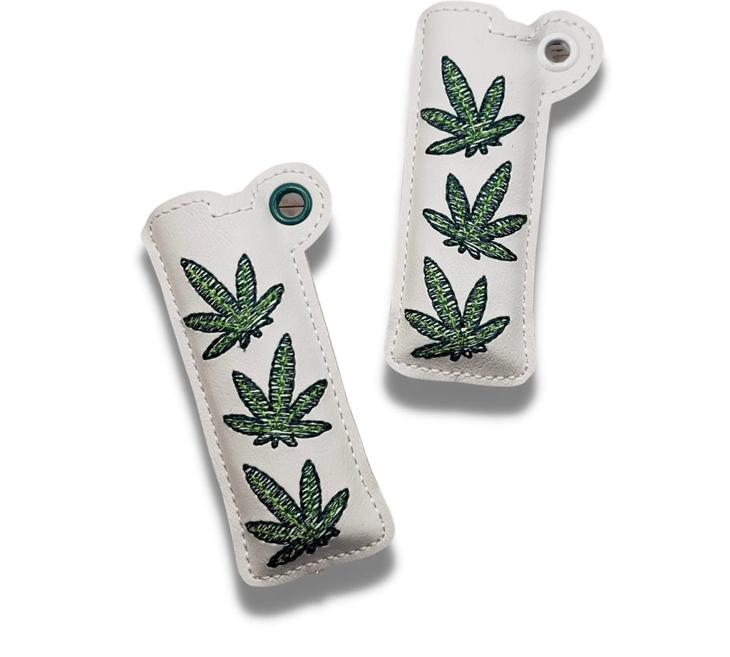 Estuche para encendedor con hojas de cannabis