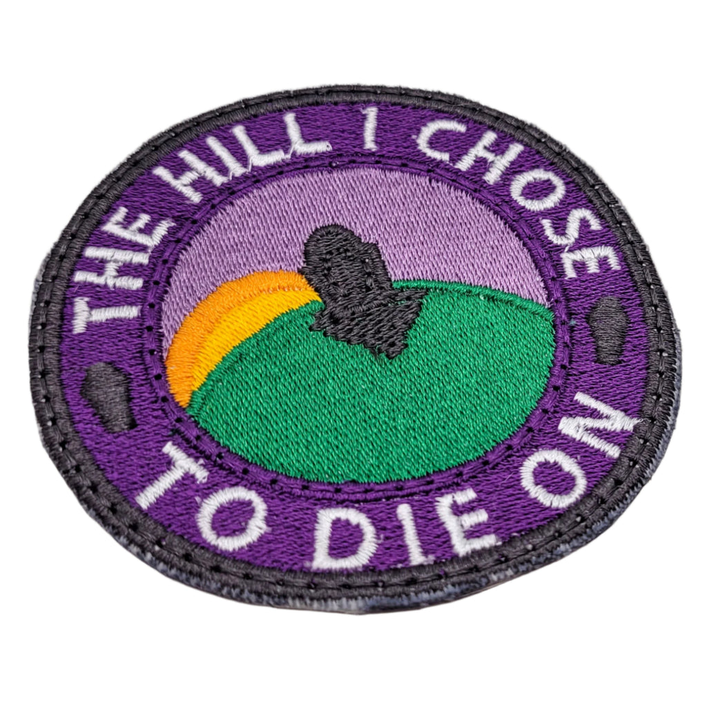 Embroidered patch with text 'The Hill I Chose To Die On' on a white background.