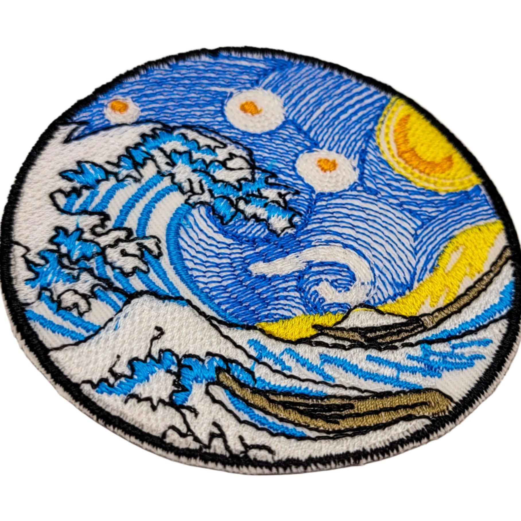 Embroidered patch with wave design on a white background.